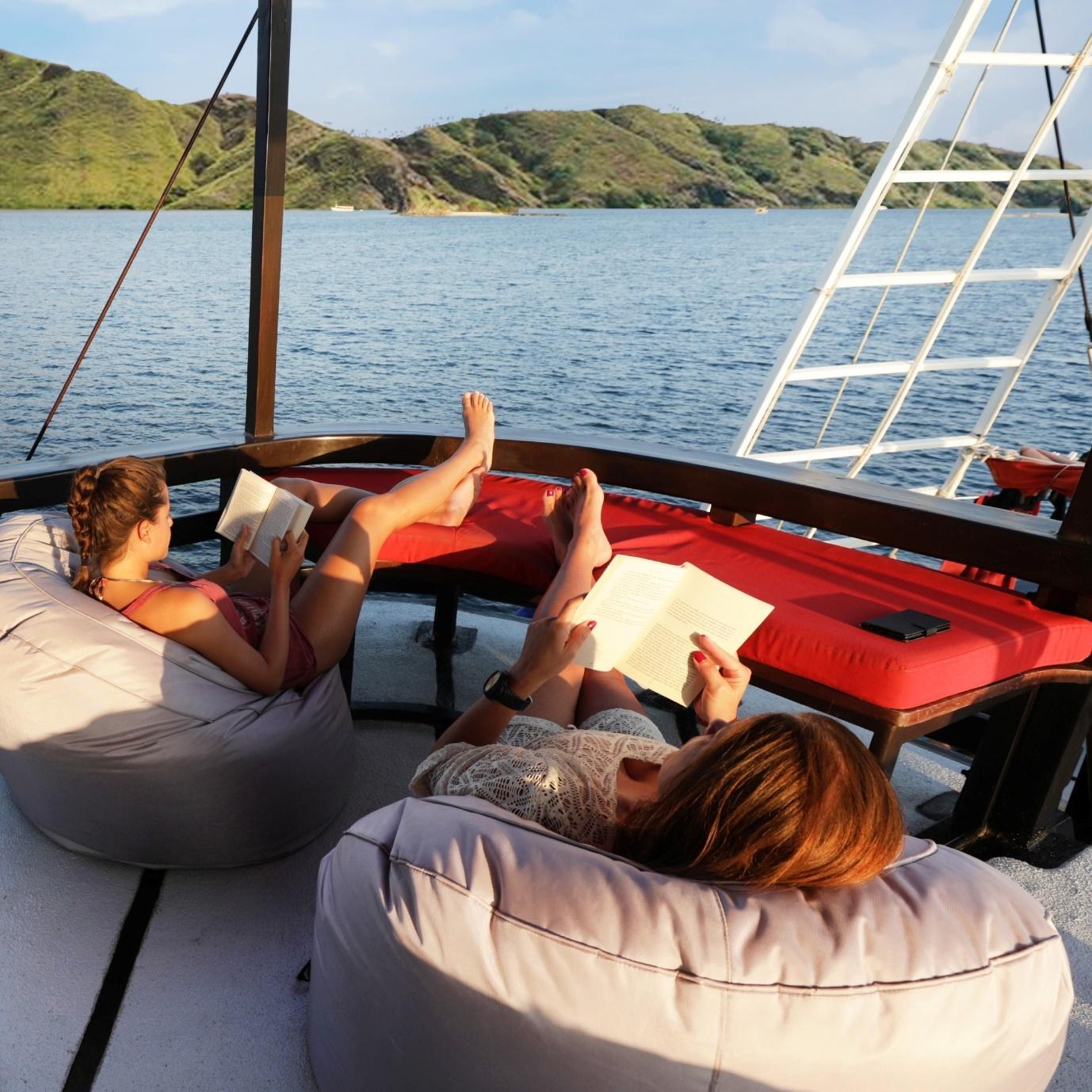 guest relaxing on la galigo liveaboard deck