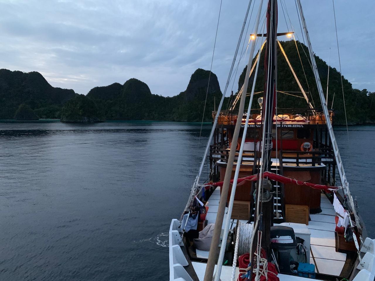 la galigo boat on sun rise at Raja Ampat