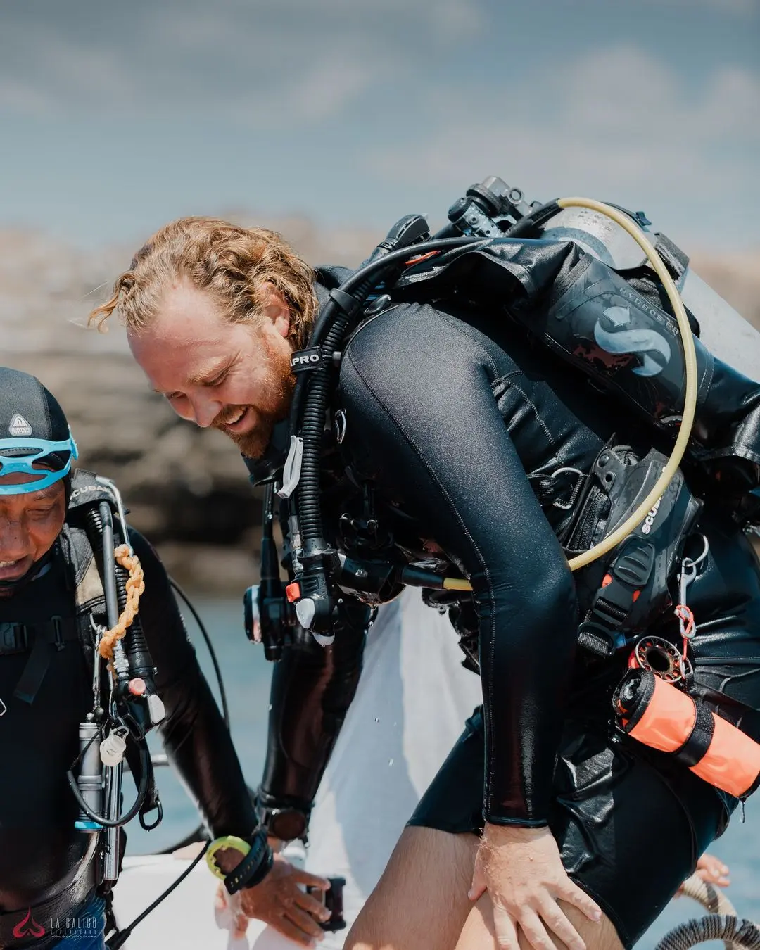 divers post dive with smile
