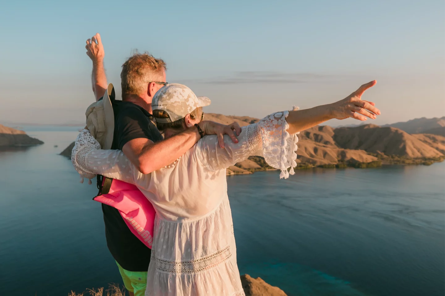 couple posing on top of padar island in komodo