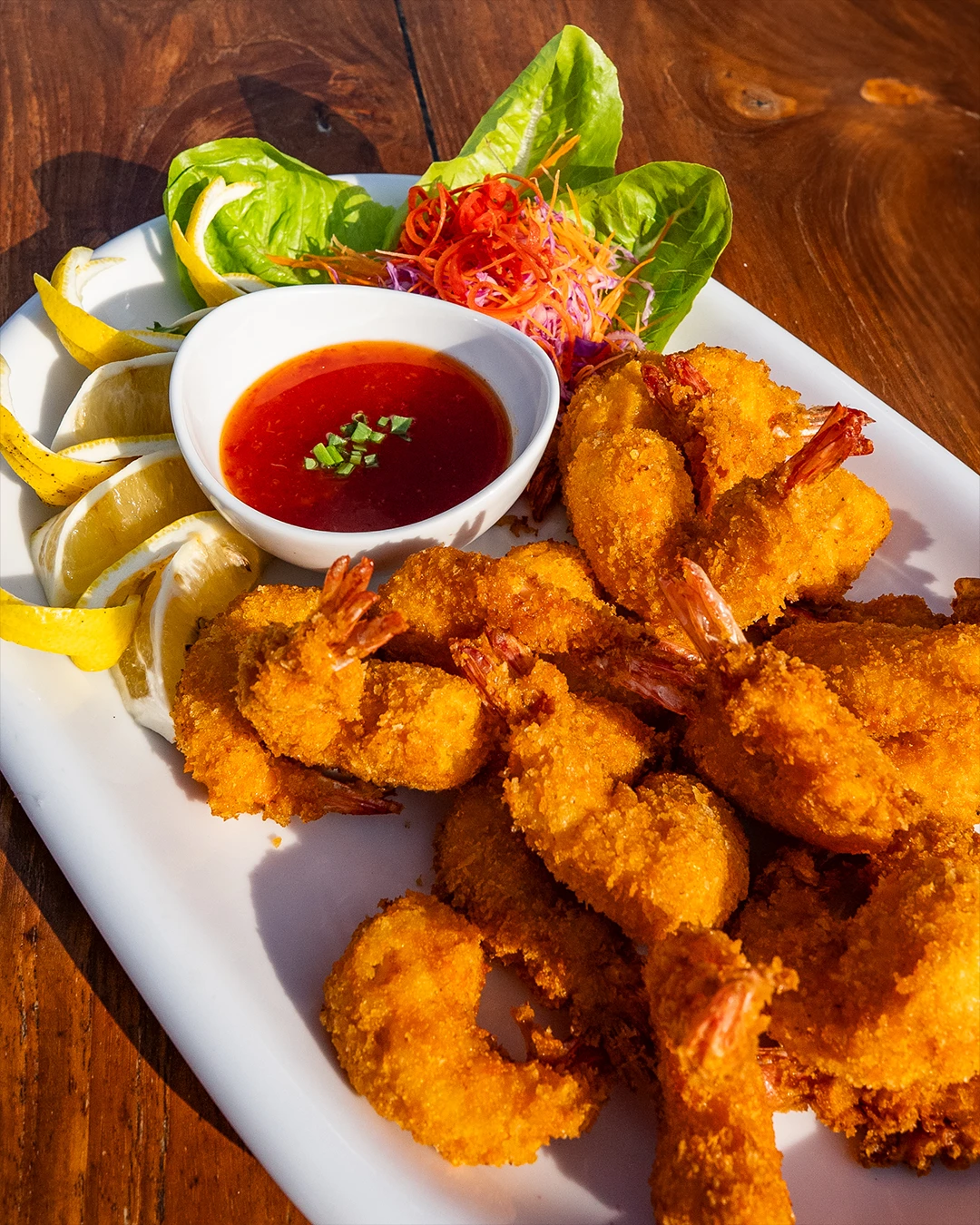 Crispy fried shrimp paired with sweet chili dipping sauce.